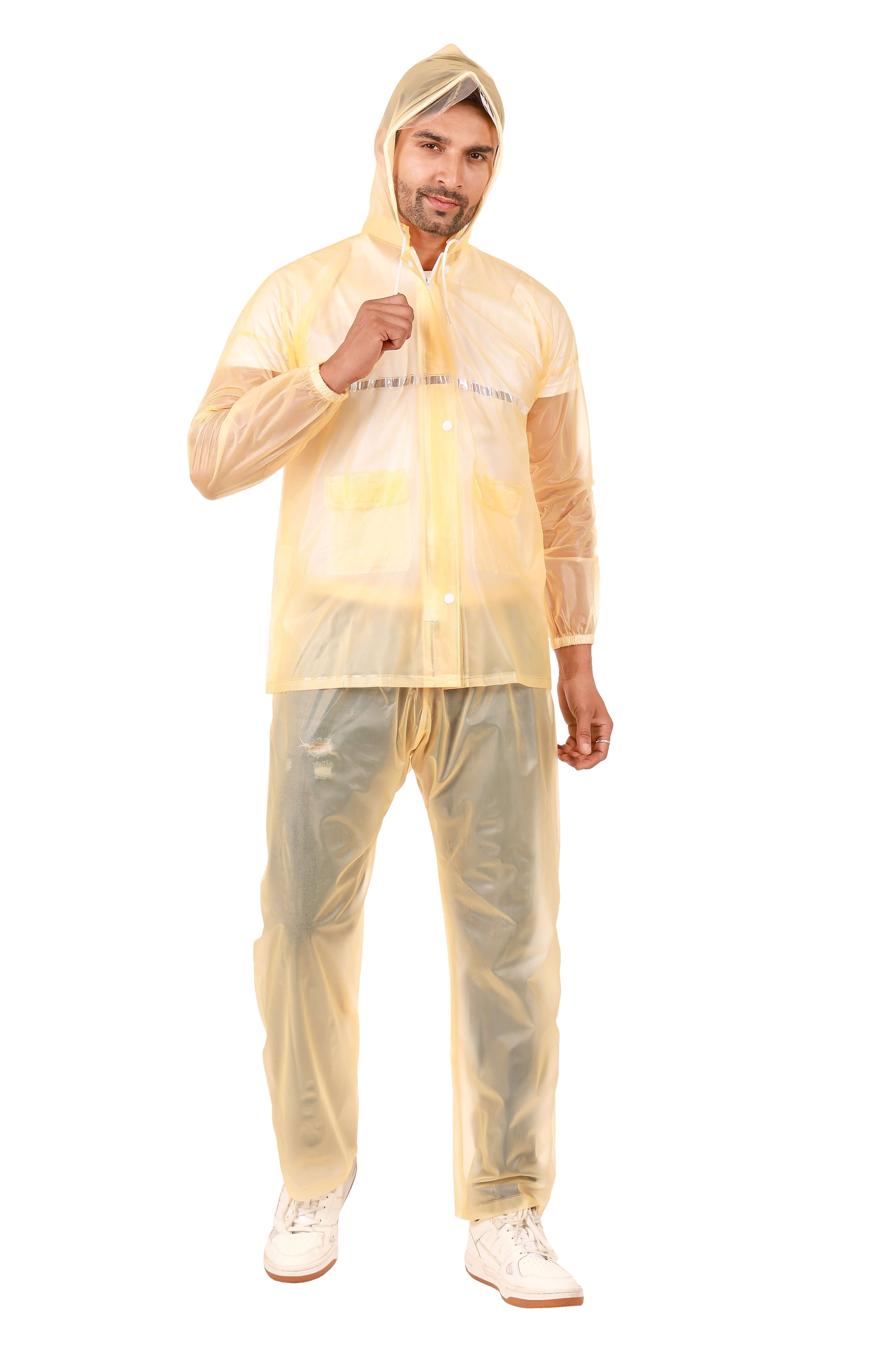 Man wearing Rainwear Jacket with Pant PVC, featuring a hood and elastic waist for wet weather protection.