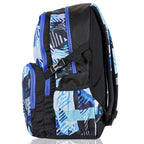 Tom 1.21 casual school backpack 33L in black and blue geometric design, perfect for school and travel.